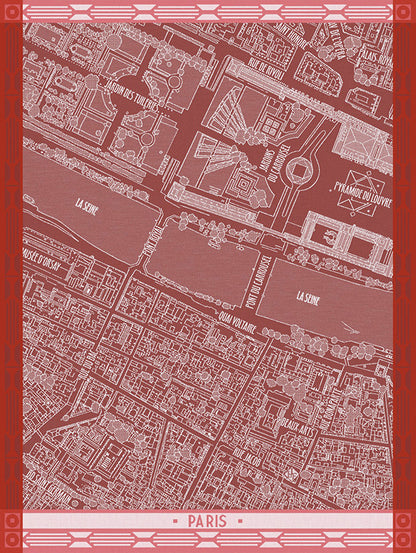 A Paris city map art dishtowel featuring a detailed street and building layout in light pink on a muted rose-red background, framed by a decorative pink border with 'PARIS' at the bottom.