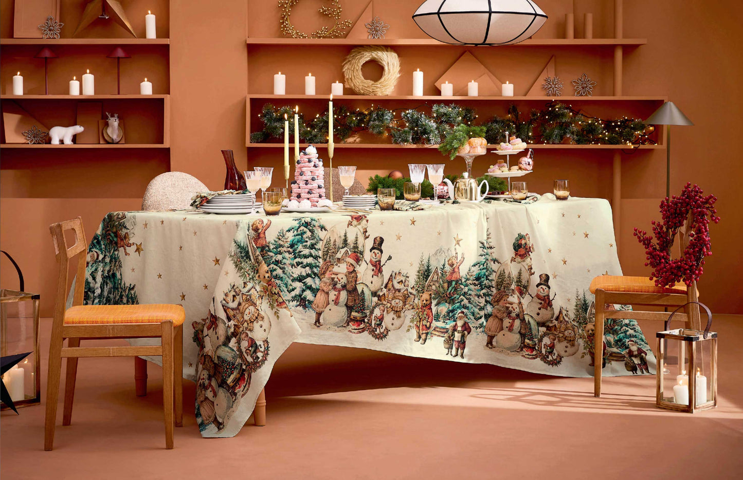 A festive winter-themed tablecloth featuring a detailed print of vintage snowmen, Santas, and evergreen trees on a cream cotton-linen blend fabric.