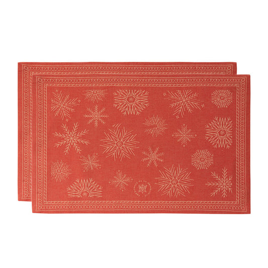 Red Sous Les Étoiles French jacquard placemats with gold snowflakes.