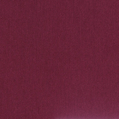 A close-up of a confettis cotton napkin in a garance aubergine.
