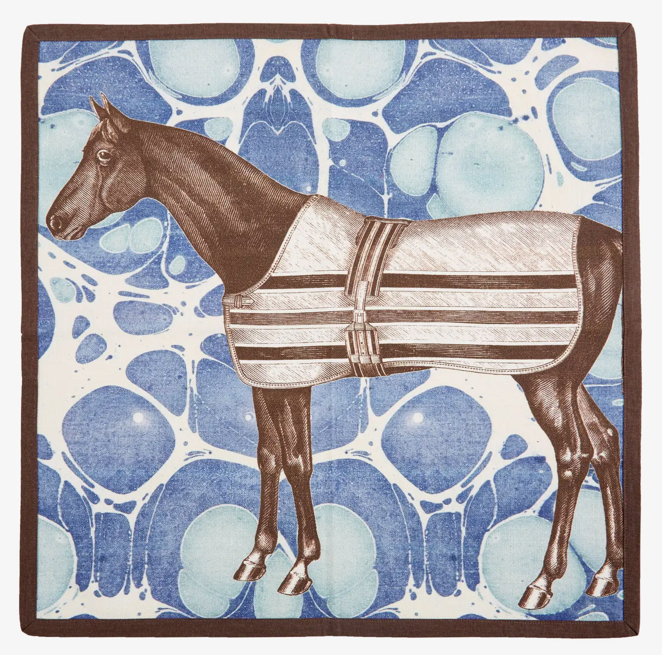 A blue, square Horse Marble cotton dinner napkin finished with a crisp, dark brown piped edge.
