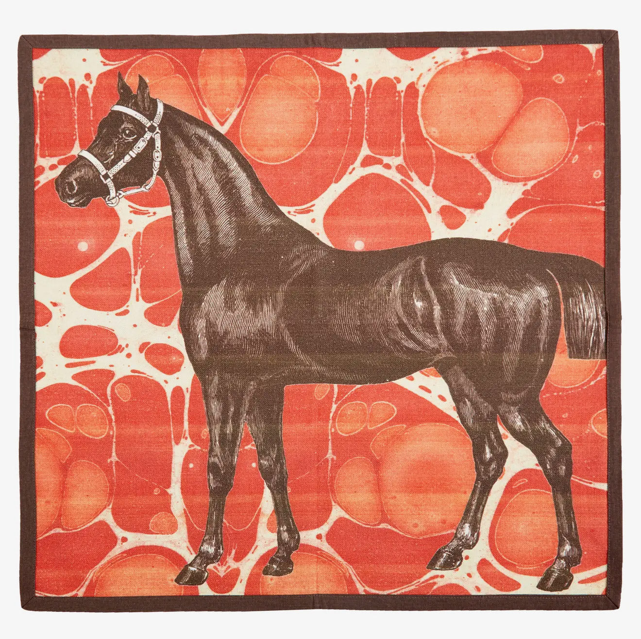 A square red Horse Marble cotton dinner napkin finished with a crisp, dark brown piped edge.