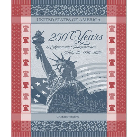 Red, white, and blue cotton jacquard kitchen towel celebrating 250 years of American Independence (1776–2026). The design features the Statue of Liberty, the American flag, "We the People" text and the Liberty Bell border