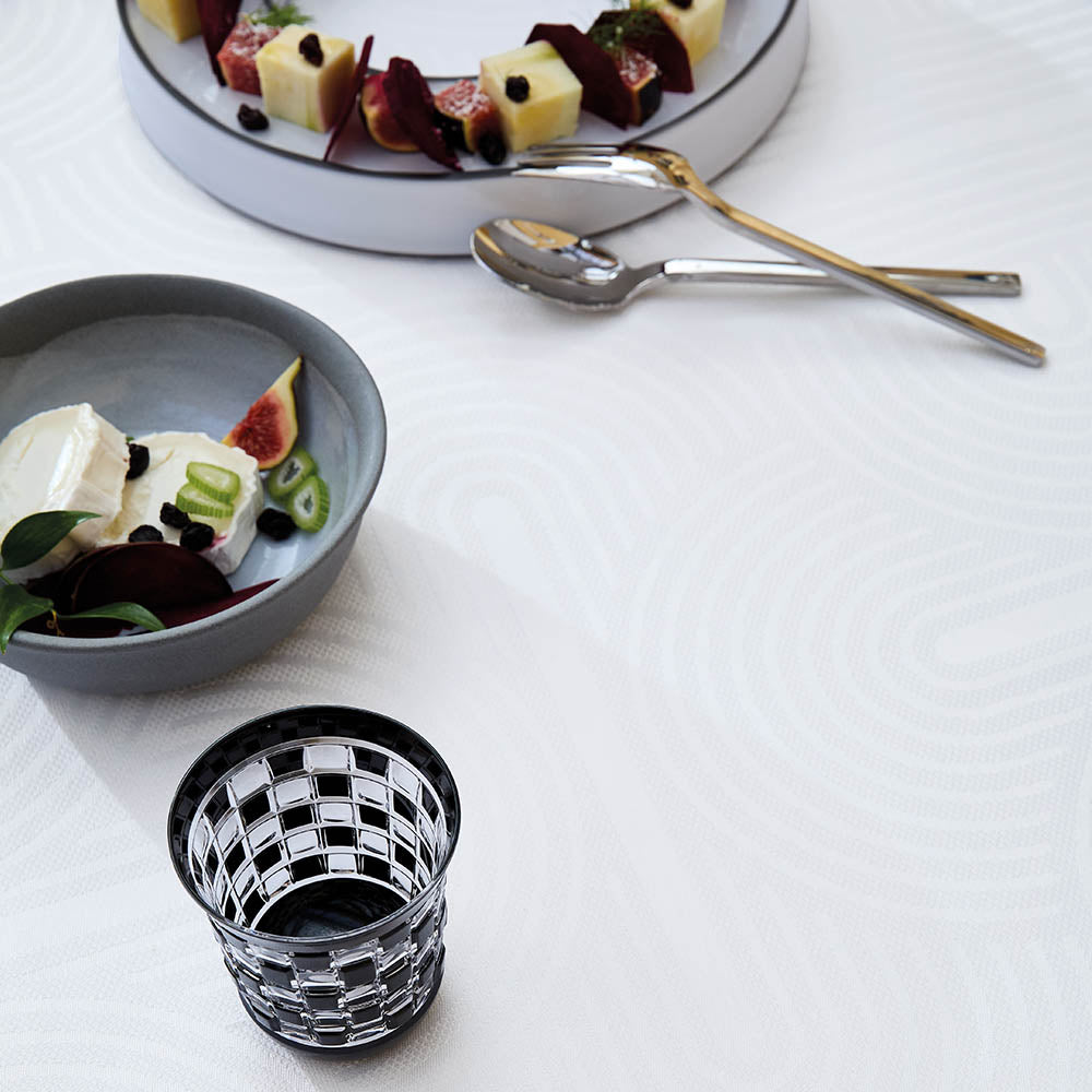 A close-up of the Le Cercle Blanc Jacquard cotton weave pattern.