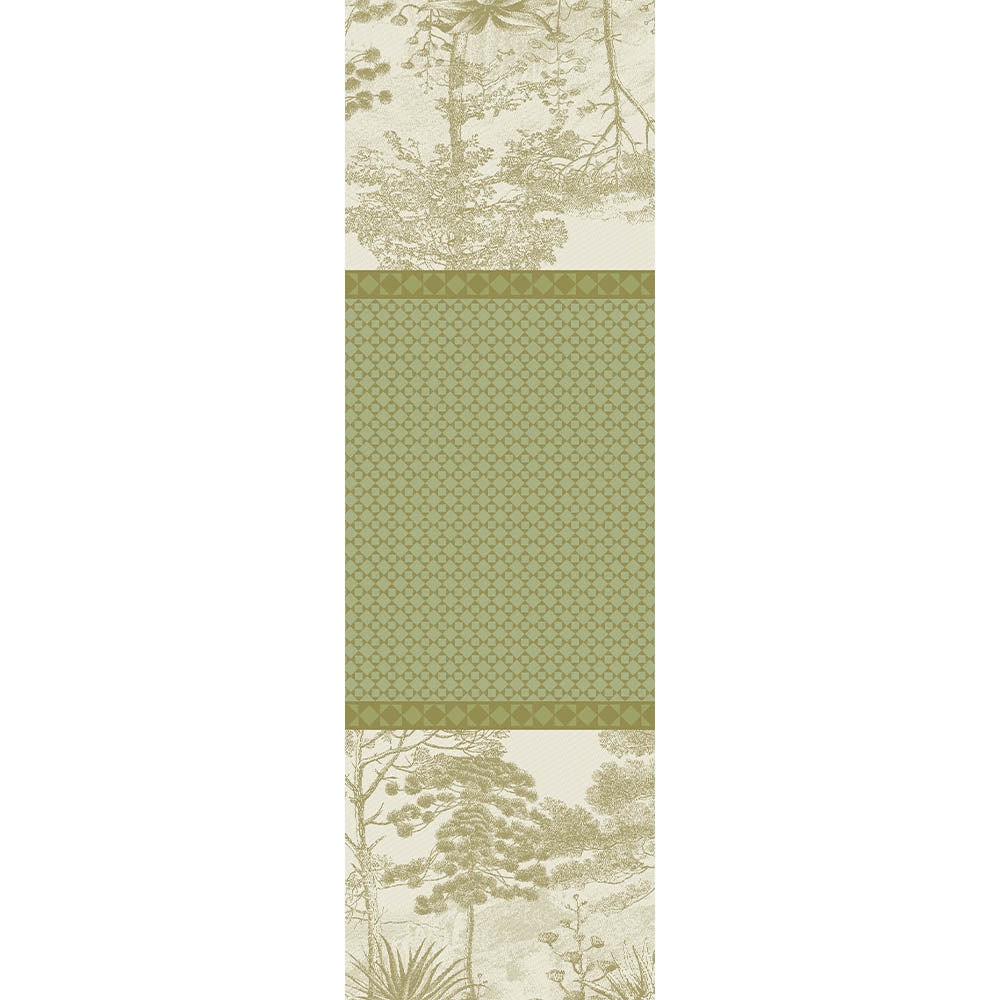 Full view of Le Sud Vert Jacquard Table Runner with shades of green geometric patterns and tree motifs.