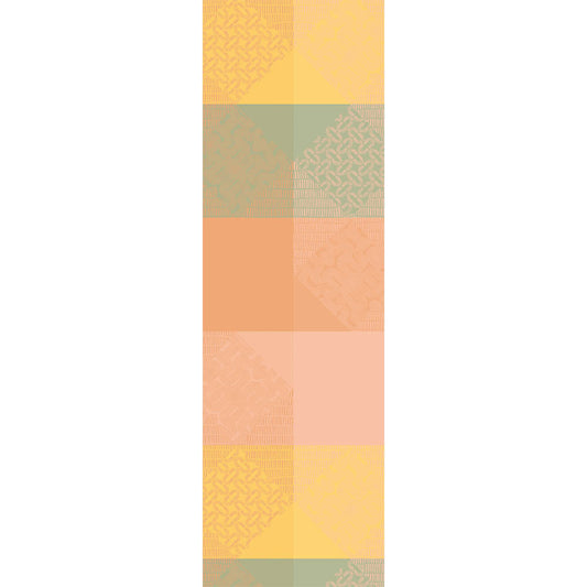 Full view of the Mille Empreintes Pastel Jacquard Table Runner in yellow, green, and salmon pink cotton plaids and geometric patterns.