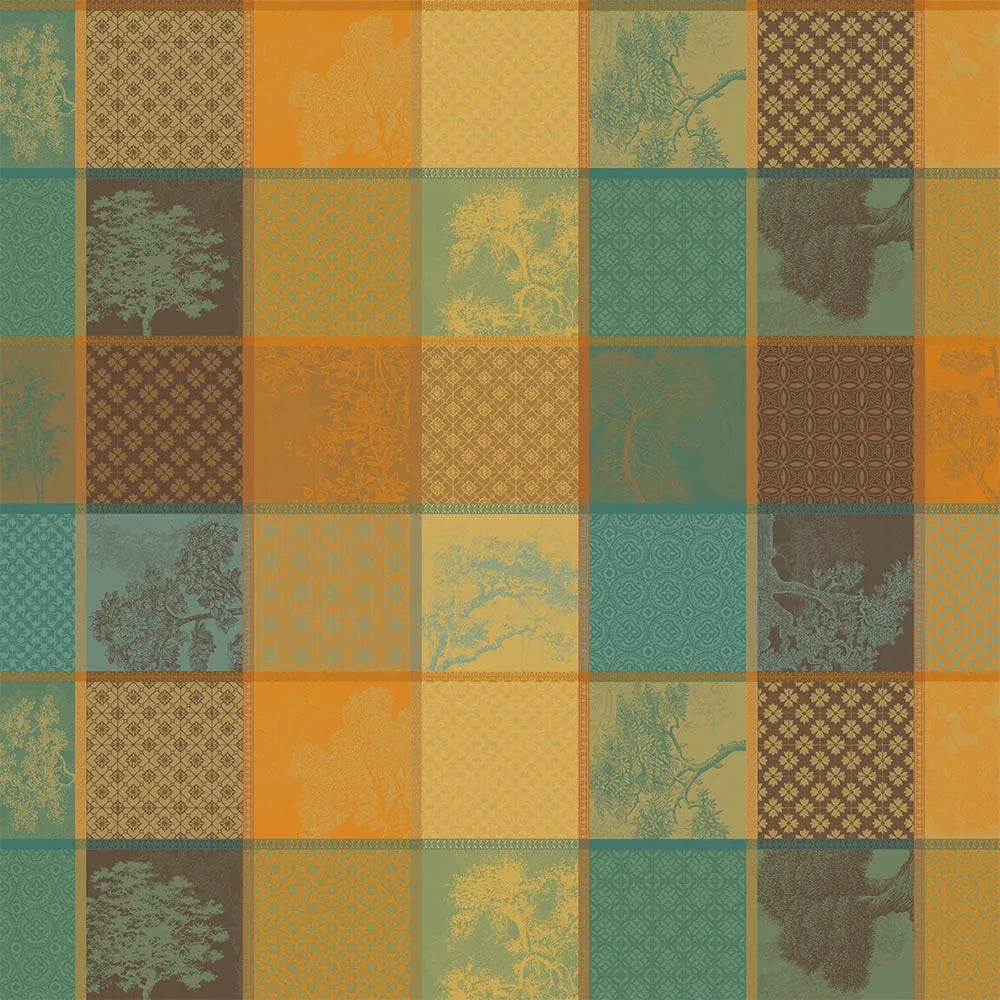 Warm-toned patchwork plaid cotton jacquard tablecloth in teals, browns, orange, and gold.