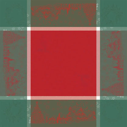 A flat lay view of the Noel Magique Houx cotton jacquard tablecloth spread flat. It features a vibrant, solid red square center framed by white-and-red textured striped borders, with a wide, forest green outer border woven with delicate red holiday illustrations including Christmas trees, houses, and stars.