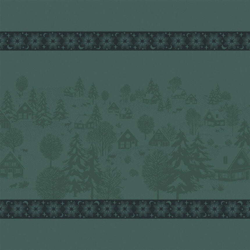 Full view of a green Sous Les Étoiles French cotton jacquard napkin featuring an illustration of a winter village and snowflakes.