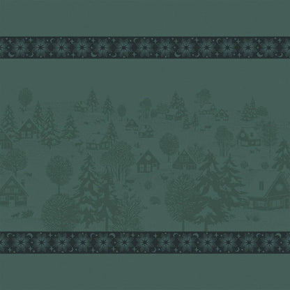 Full view of a green Sous Les Étoiles French cotton jacquard napkin featuring an illustration of a winter village and snowflakes.