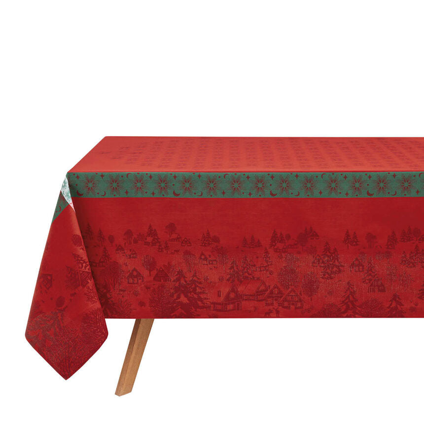 A red Sous Les Étoiles jacquard tablecloth.
