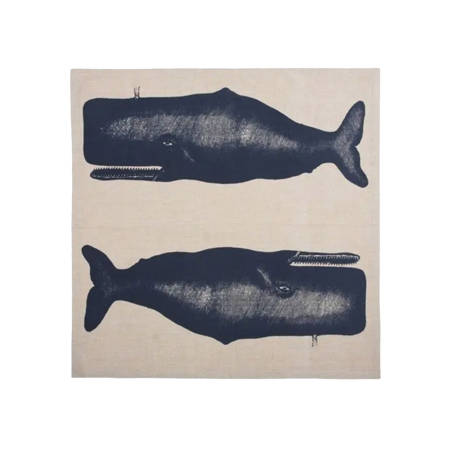 A flat-lay view of a square, off-white cotton dinner napkin featuring two large, detailed illustrations of mirror-image whales screen-printed in deep navy blue ink.